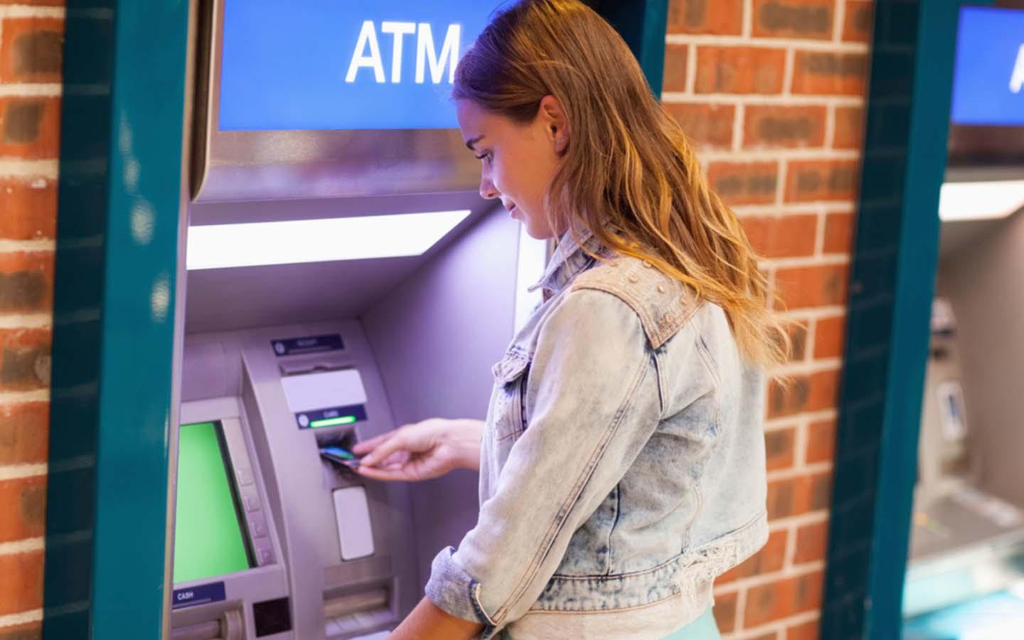 woman using ATM
